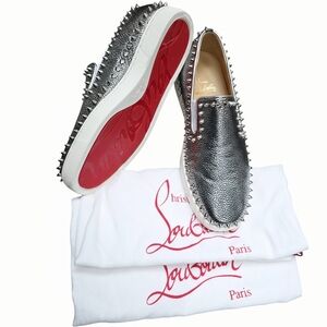 Christian Louboutin Silver Spike-Embellished Slip-On Sneakers with Red Soles